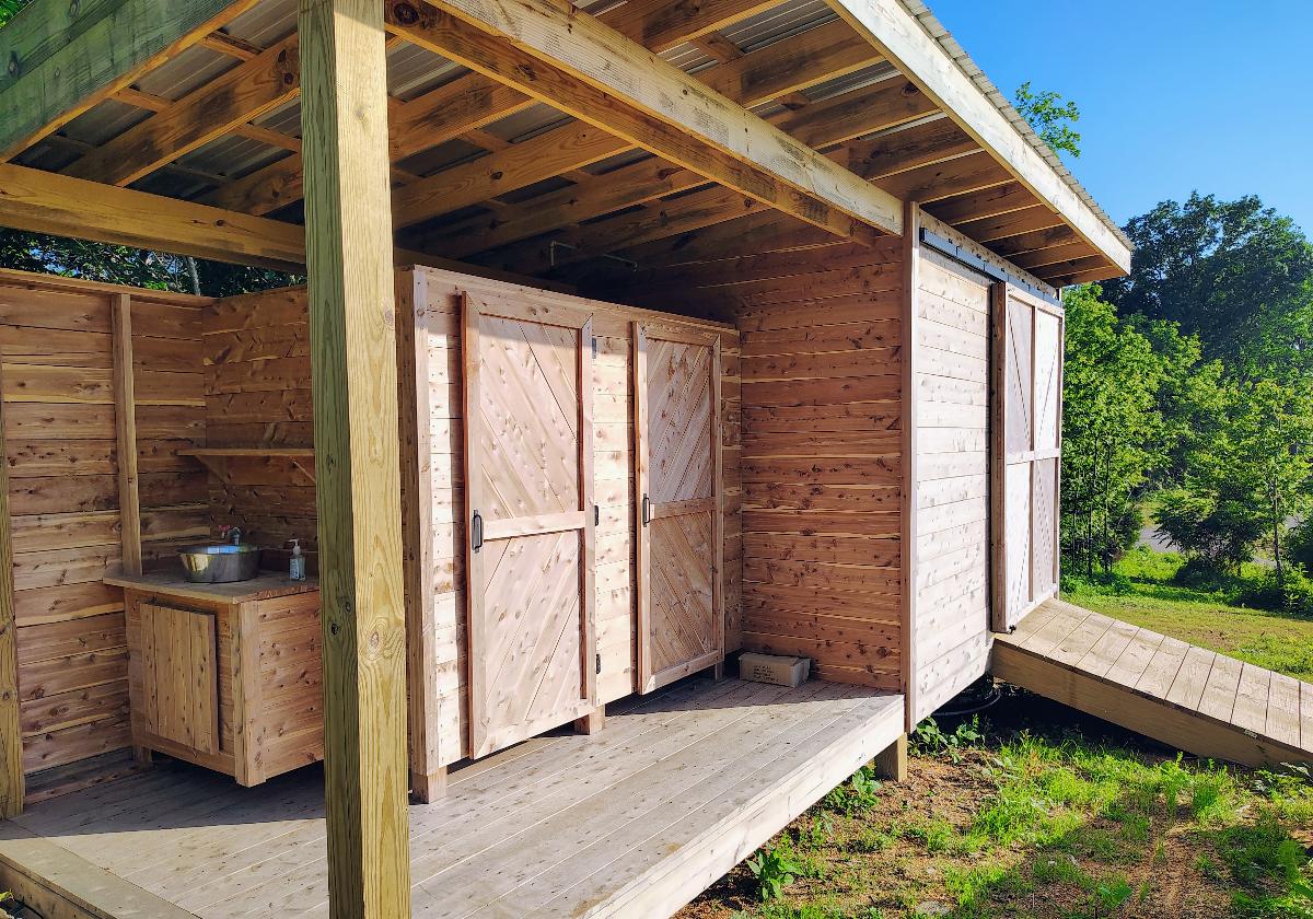 The cedar shower and toilet house